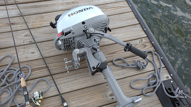 A Honda Marine outboard motor up close 
